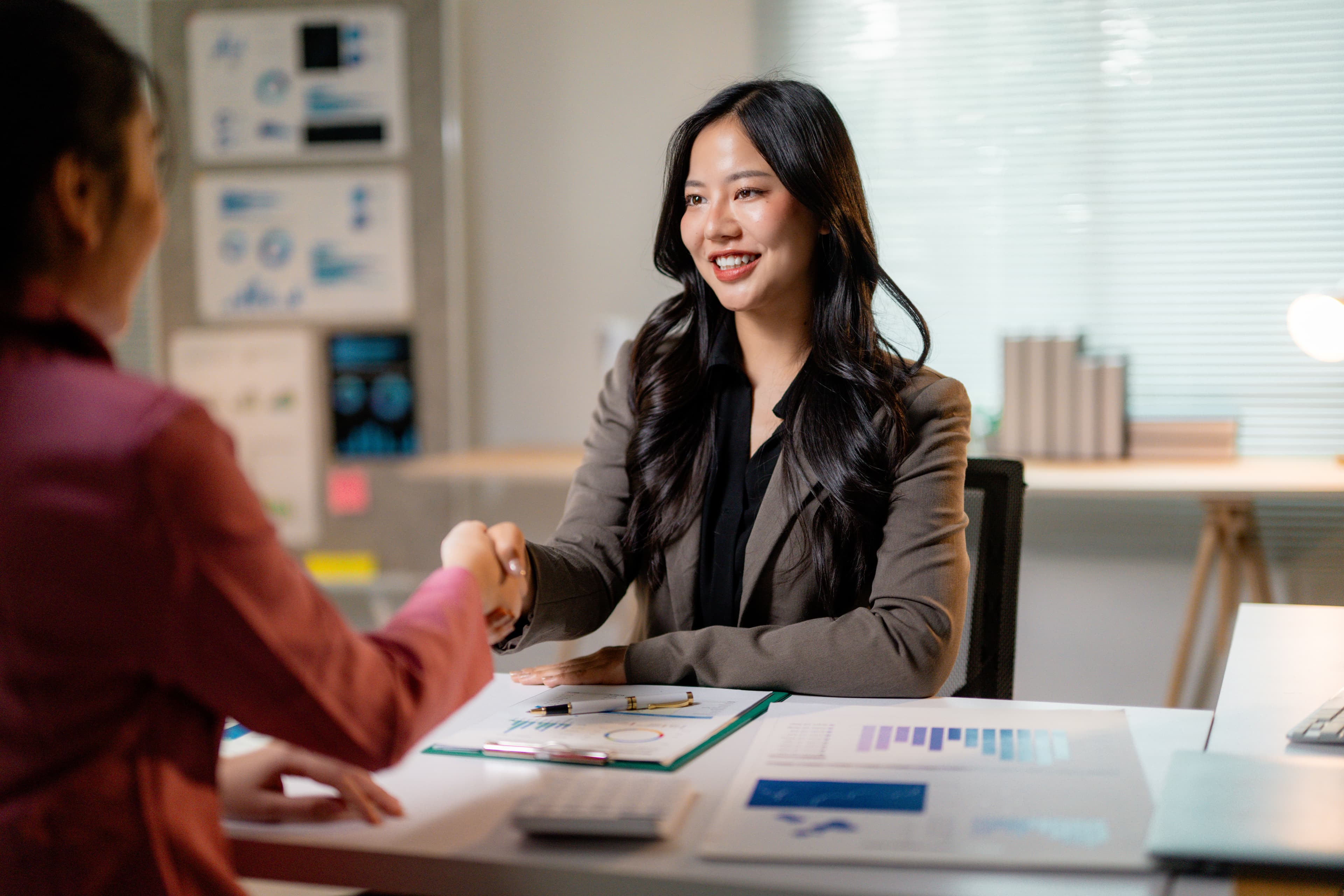 Business Woman Shaking Hands